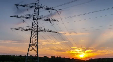Power Line Timelapse with beautiful Sundown Pan Right Stock Footage 136984017