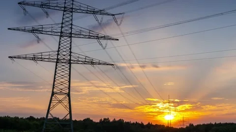 Power Line Timelapse with beautiful Sundown Zoom Out Stock Footage 136984927