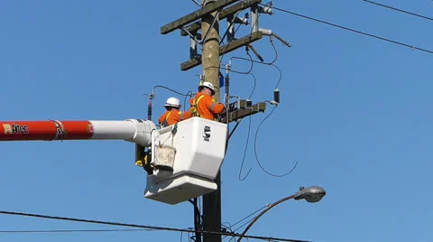Power Line Workers Make Repairs Stock Footage 22543989