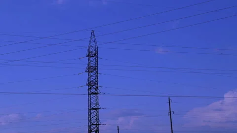Power lines against the sky with clouds. Time laps Stock Footage 109000546