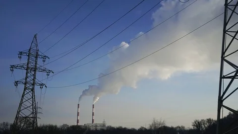 Power lines and pipe smoke power plant timelapse Stock Footage 73526302