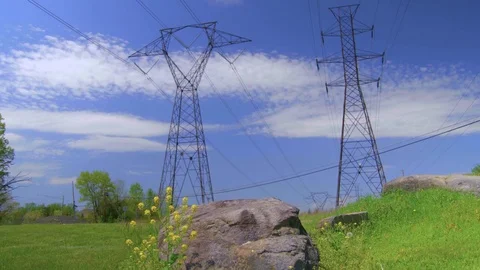 Power Lines and a rock Stock Footage 77423430