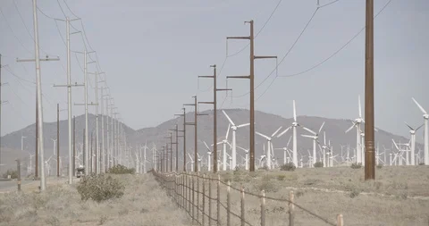 Power Lines and Wind Mills in California Stock Footage 89942484