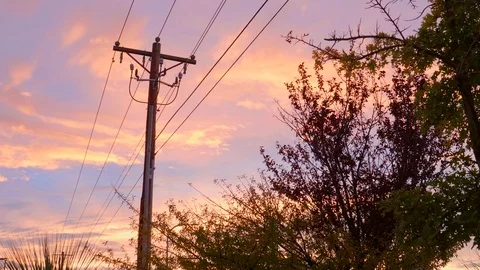 Power Lines with a Beautiful Sunset Stock Footage 99972623