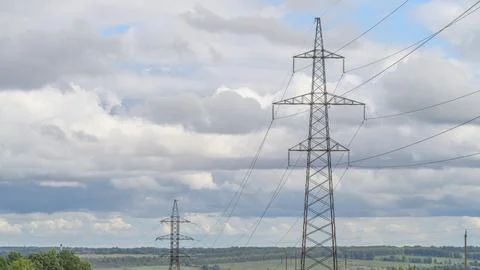 Power Lines Below a Dramatic and Beautiful Sky with Amazing Cloud Formations Abo 写真素材