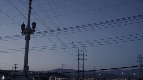 Power Lines at dusk Vídeo Stock 77512456