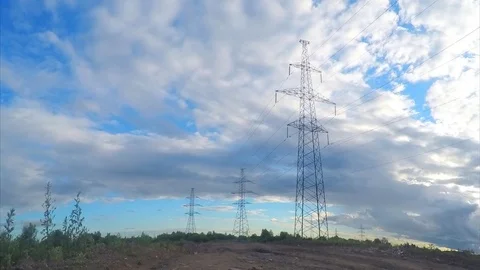 Power lines on field on summer timelapse Stock Footage 81605276