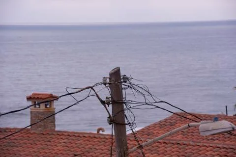 Power lines on lamp post Stock Photos