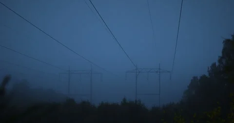 Power lines in landscape during blue hour Vidéo 263037826