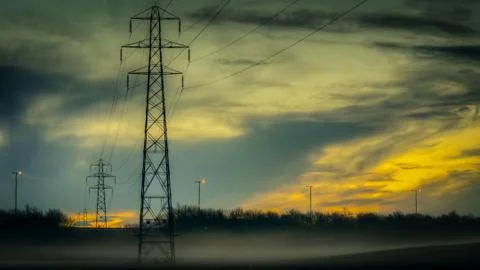 Power lines in the mist Stock Photos