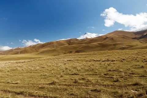 Power lines in the mountains Stock Photos