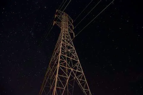 Power lines at night Stock Photos