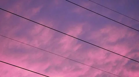 Power Lines on a Pink Backdrop Stock Photos