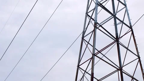 Power lines plane close up with passing by air plane Stock Footage 254798560