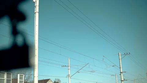 Power lines on road Stock Footage 98450759