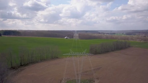 Power lines running through farm Stock Footage 129087691