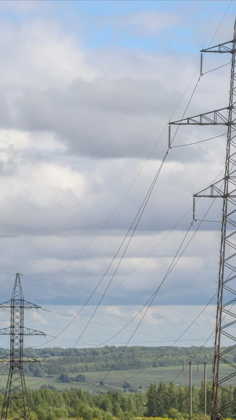 Power Lines Set Against a Dramatically Beautiful Sky Filled With Vivid Colors an 스톡 동영상 325682191