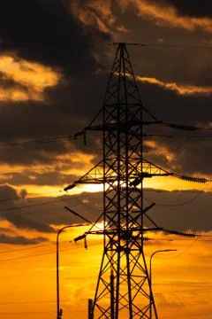 Power lines in the setting sun Stock Photos