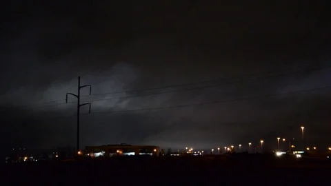 Power lines silhouette over night winter sky Video stock 85325867