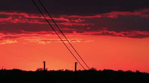 Power lines silhouettes at sunset Video stock 12169824