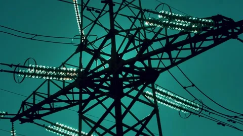 Power lines with sun rays on blue sky. H... | Stock Video | Pond5