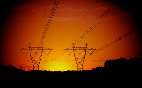 Power lines at sunset Foto stock