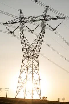 Power lines at sunset Stock Photos
