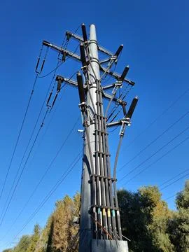 Power lines. Transition structure overhead to underground Stock Photos