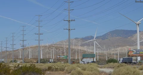 Power Lines, Windmills and the Freeway Stock Footage 115095601