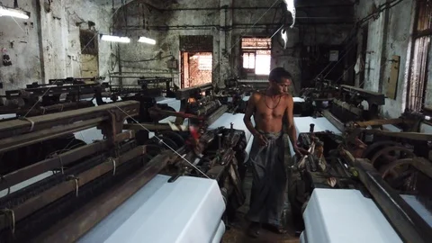 Power loom workshop in the textile city of Bhiwandi Stock Footage 121186922