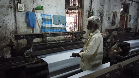 Power loom workshop in the textile city of Bhiwandi Stock Footage 121186962