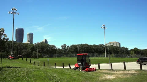 Power mower cutting grass Stock Footage 25912801