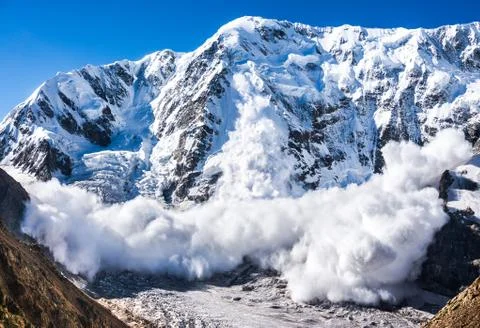 Power of nature. Avalanche in the Caucasus Stock Photos