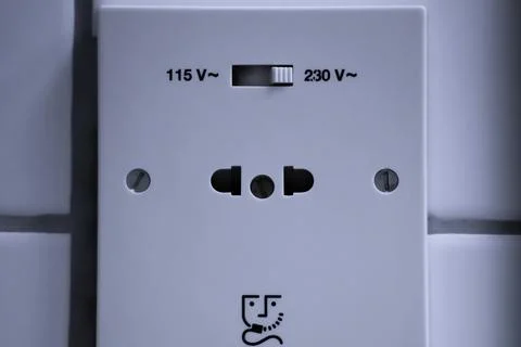 Power outlet plug for both US and European appliances. Close up. Stock Photos