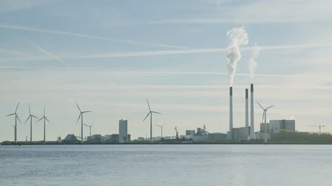 Power plant and windmills in Copenhagen, Denmark Stock Footage