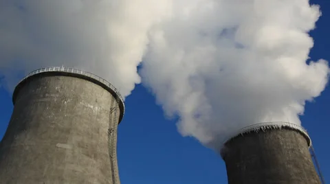 Power plant chimney with icicles, wide shot Stock Footage 34297799