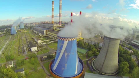 Power plant complex with cooling towers during the day Stock Footage 32153364