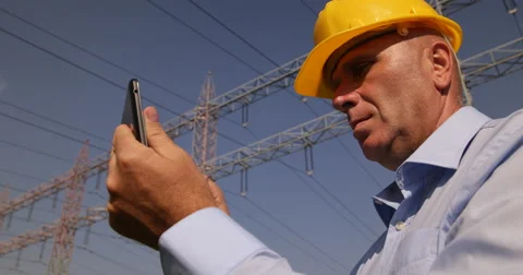 Power Plant Infrastructure Engineer Man Use Digital Tablet Check Electric Cables Stock Footage 50060132