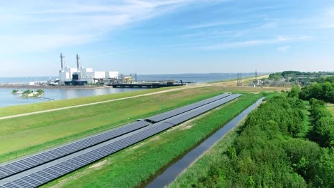 Power Plant with Long Rows of Solar Panels - Flevoland, Holland, 4K Drone Stock Footage 145926862