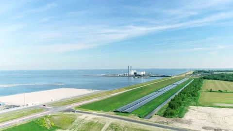 Power Plant with Long Rows of Solar Panels - Flevoland, Holland, 4K Drone Stock Footage 145926974