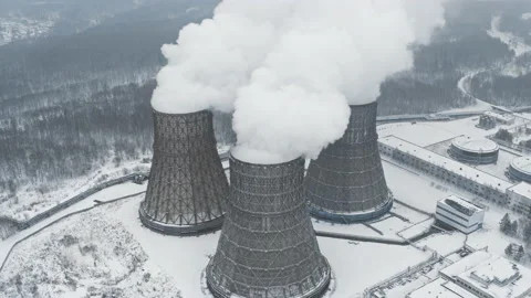 Power plant is operating at full capacity, winter heating season in city Stock Footage 220307928