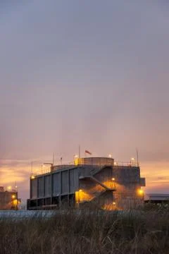 Power plant at sunset. Stock Photos