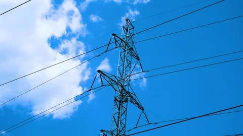 . Power plant timelapse timelapse electricity - High-voltage support. clouds in Stock Footage