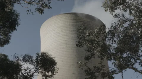 Power plant with trees Stock Footage 56879405