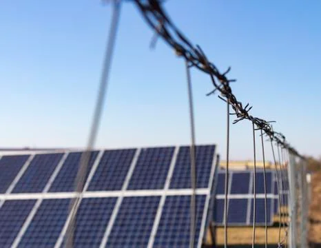 A power plant using renewable solar energy with the sun. solar panels stand o Stock Photos