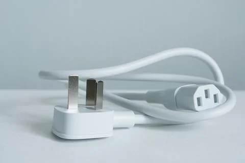 Power plug and power cable on a white background. Power supply concept Stock Photos