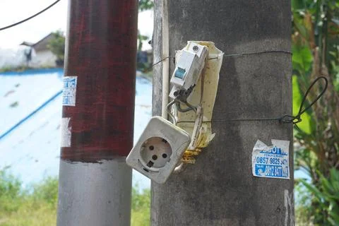 The power plug is broken on the electric pole Stock Photos