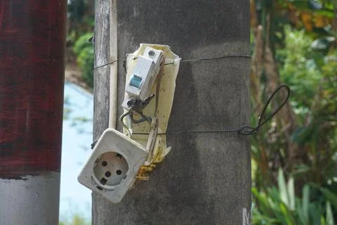 The power plug is broken on the electric pole Stock Photos