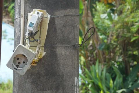 The power plug is broken on the electric pole Stock Photos