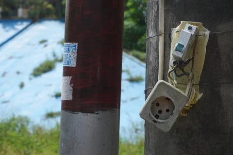 The power plug is broken on the electric pole Stock Photos